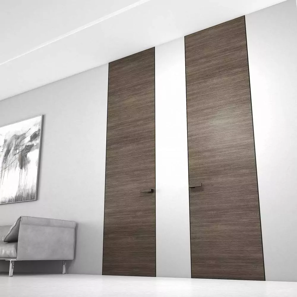 FILO–60, Alu, Vento model, natural veneer Rovere Cenere. Hidden door frame, aluminum end edge and handle in Dark Brown color. The "under the ceiling" option.