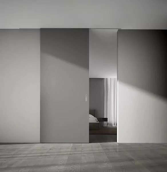 STRATUS–LAGO, frosted glass Glass Grigio Fume Matt, aluminum canvas frame in Chrome Matt color. Sliding partition along the wall, hidden track in the ceiling.