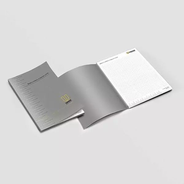 Branded UNION notebook in a cage.