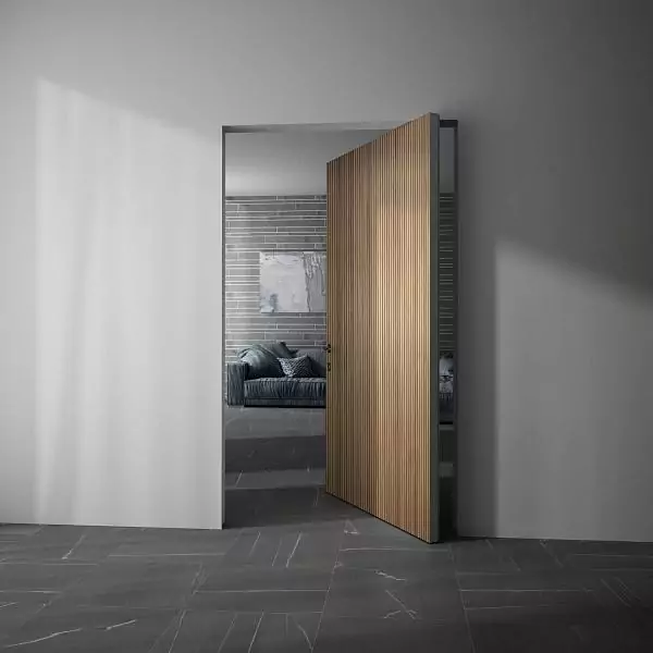 PIVOT-60, Alu, Step-V model, natural veneer Noce Canaletto, 3D volumetric milling. Aluminum edge, hidden door frame and handle in Black finish.